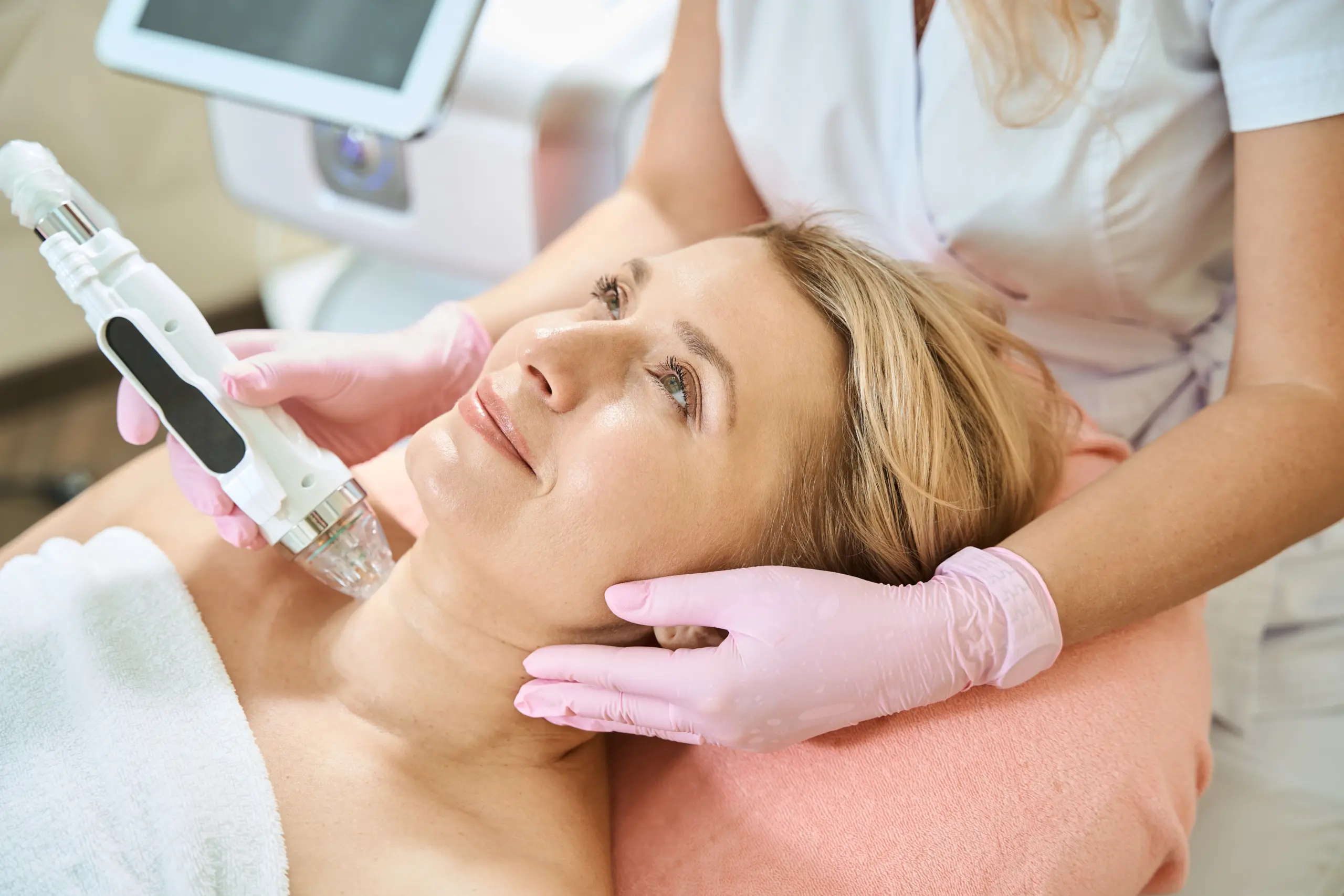 Aesthetic provider performing microneedling with an RF device on a woman’s face at Skindale Medspa in Scottsdale, AZ